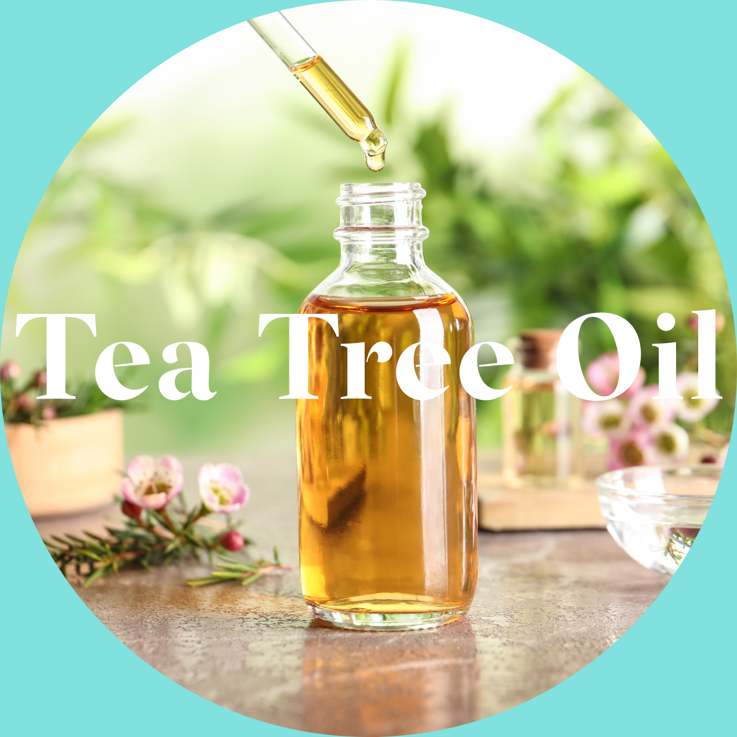 Tea tree oil bottle with dropper and flowers on a blurred background