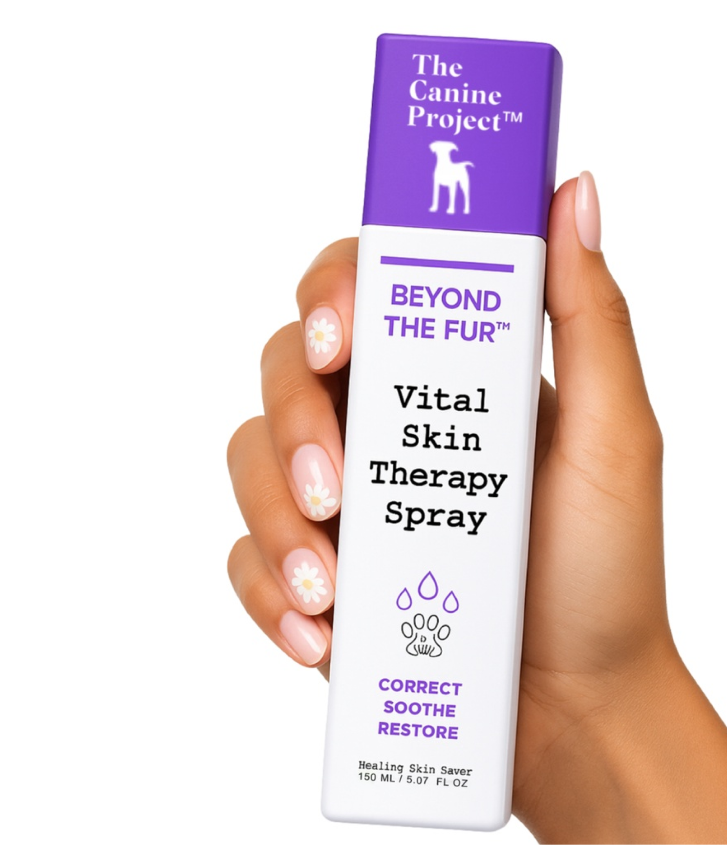 Hand holding a bottle of 'Beyond the Fur' Vital Skin Therapy Spray by The Canine Project on a white background