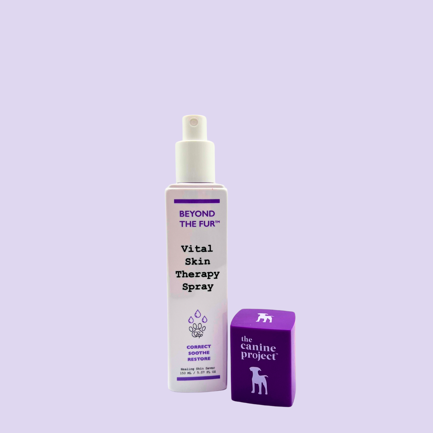 Vital Skin Therapy Spray bottle and packaging on a light purple background