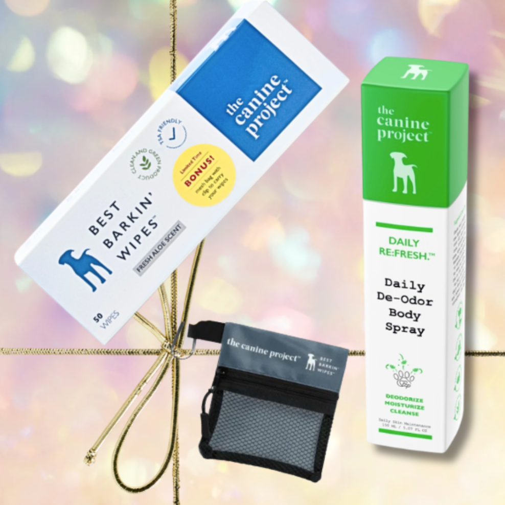 The Canine Project pet care products including wipes, spray, and pouch on a colorful background